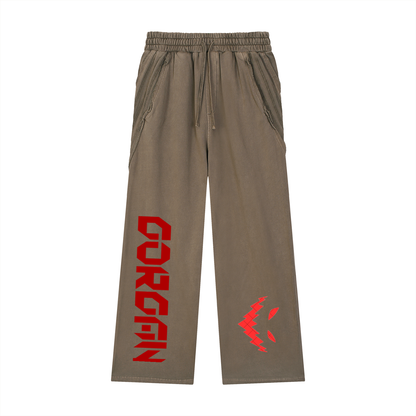 ODMPOD Snow Washed Tape Raw Edge Sweatpants showing relaxed fit, distressed raw hems, and casual streetwear style.
