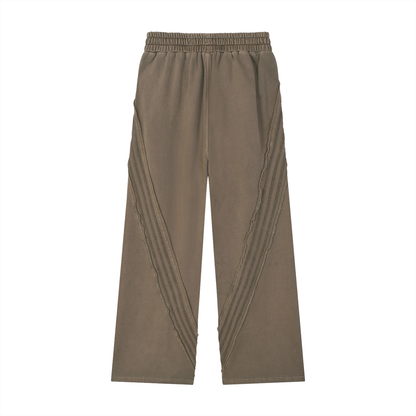 Snow Washed Tape Raw Edge Sweatpants from ODMPOD featuring a relaxed fit, raw hem, and snow-washed fabric in a casual style.