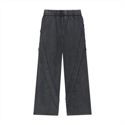 ODMPOD Snow Washed Tape Raw Edge Sweatpants with distressed hem and relaxed fit, shown in light gray fabric.